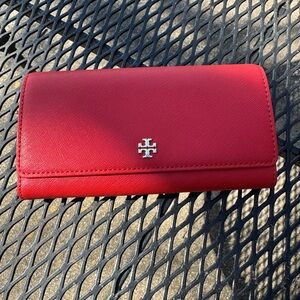 Tory Burch Scarlet Red Wallet with 12 card holders and zipped middle section.